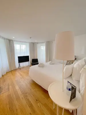Un ou plusieurs lits dans un hébergement de l'établissement Les Garennes - Hôtel Spa Bénodet