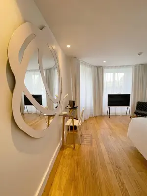 Un ou plusieurs lits dans un hébergement de l'établissement Les Garennes - Hôtel Spa Bénodet