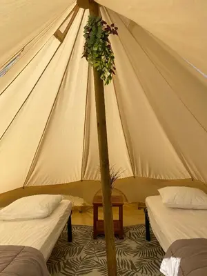 Un ou plusieurs lits dans un hébergement de l'établissement Camping Cap-Ouest