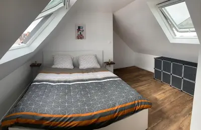 Un ou plusieurs lits dans un hébergement de l'établissement Duplex calme et cosy