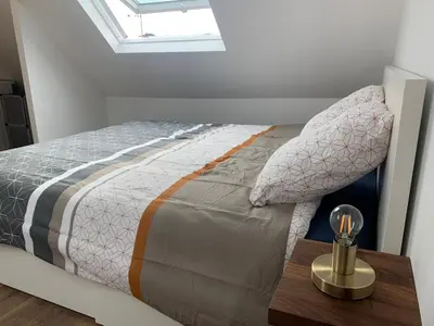 Un ou plusieurs lits dans un hébergement de l'établissement Duplex calme et cosy