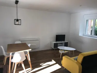 Coin salon dans l'établissement Appartement calme et chaleureux
