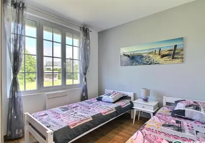 Un ou plusieurs lits dans un hébergement de l'établissement Maison proche du Phare de Trézien vue mer