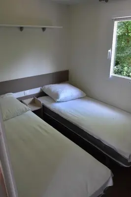 Un ou plusieurs lits dans un hébergement de l'établissement mobil-home à la campagne
