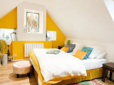 Un ou plusieurs lits dans un hébergement de l'établissement CHAMBRE APPARTEMENT