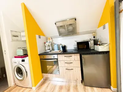 Cuisine ou kitchenette dans l'établissement CHAMBRE APPARTEMENT