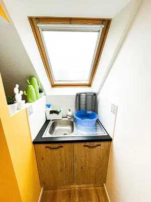 Cuisine ou kitchenette dans l'établissement CHAMBRE APPARTEMENT