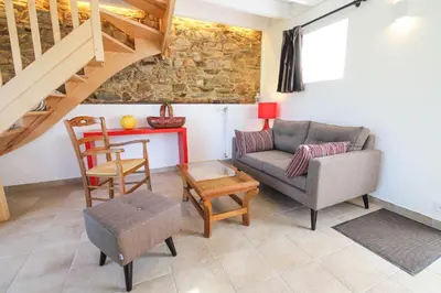 Coin salon dans l'établissement Domaine des Fougères