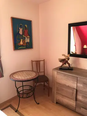 Télévision ou salle de divertissement dans l'établissement Kerlauma