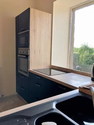 Cuisine ou kitchenette dans l'établissement Kerlauma
