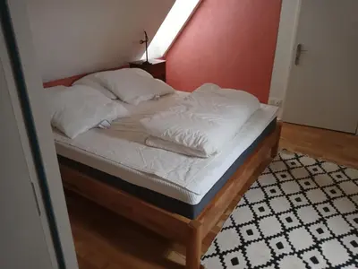 Un ou plusieurs lits dans un hébergement de l'établissement Gîte du manoir de Keryvoas