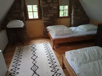 Un ou plusieurs lits dans un hébergement de l'établissement Gîte du manoir de Keryvoas