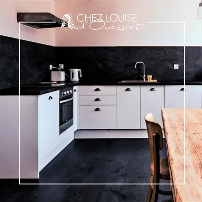 Cuisine ou kitchenette dans l'établissement Le gite de Louise