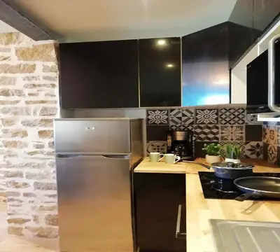 Cuisine ou kitchenette dans l'établissement tourmaline