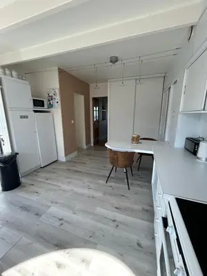Cuisine ou kitchenette dans l'établissement Maison de Vacances vue mer