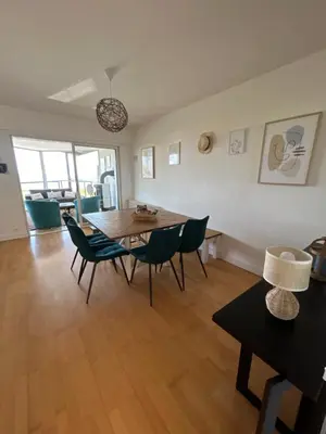 Coin salon dans l'établissement Maison de Vacances vue mer