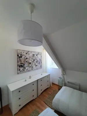 Un ou plusieurs lits dans un hébergement de l'établissement Bord de Mer l'Appartement à Loctudy