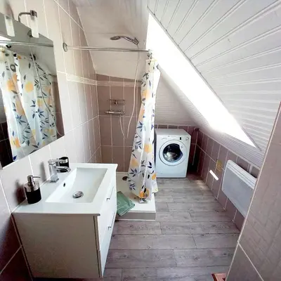 Salle de bains dans l'établissement Gite Les Sables Blancs