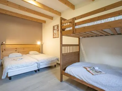 Un ou plusieurs lits dans un hébergement de l'établissement Holiday Home Villa Heol by Interhome