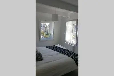 Un ou plusieurs lits dans un hébergement de l'établissement Les Appartements de Viarmes et de Guernisac
