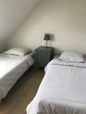 Un ou plusieurs lits dans un hébergement de l'établissement ty_yaouen maison de vacances