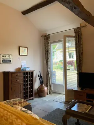 Télévision ou salle de divertissement dans l'établissement Le Cloître