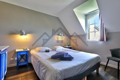 Un ou plusieurs lits dans un hébergement de l'établissement LocaLise - Maison G4 au Guilvinec - A 50m de la mer avec jardin et piscine - Tout à pied, plages, port, centre, commerces, marché - Wifi inclus - Animaux bienvenus - Linge de lit inclus