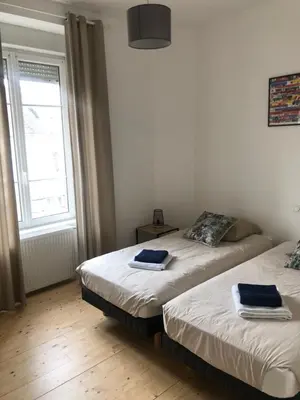Un ou plusieurs lits dans un hébergement de l'établissement Villa plaisance