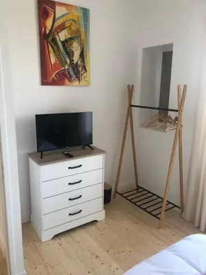 Télévision ou salle de divertissement dans l'établissement Villa plaisance