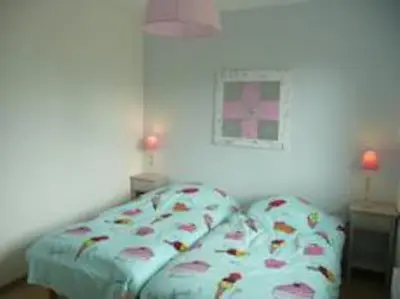 Un ou plusieurs lits dans un hébergement de l'établissement Le Paradis de Sophie