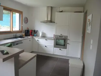 Cuisine ou kitchenette dans l'établissement Le Paradis de Sophie