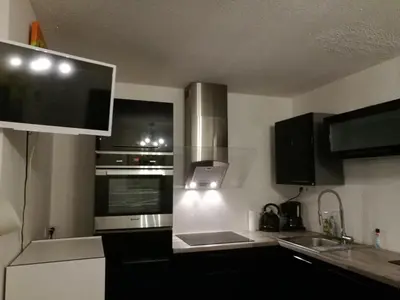 Cuisine ou kitchenette dans l'établissement FLOREVA 43 Proche plage et thalasso