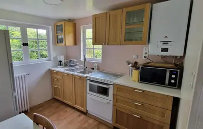 Cuisine ou kitchenette dans l'établissement Appartement de charme au Manoir !