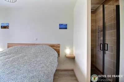 Un ou plusieurs lits dans un hébergement de l'établissement Villa le Nid Des Dunes & Spa 2 gîtes écologiques