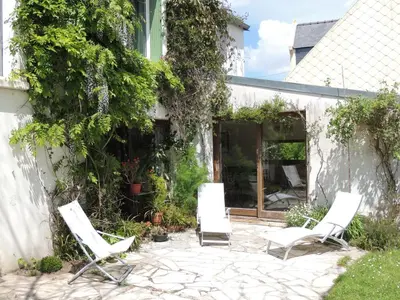 Jardin de l'établissement Grande maison avec extension d'architecte à 700m de la plage