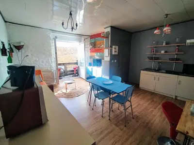 Cuisine ou kitchenette dans l'établissement L'éléphant Blanc de ConcarnOLoc