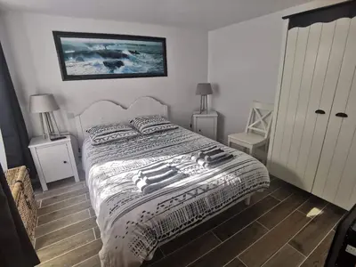 Un ou plusieurs lits dans un hébergement de l'établissement GÎTE 200 M BORD DE MER SUR GR34