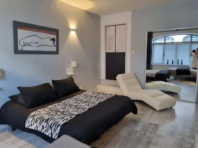 Un ou plusieurs lits dans un hébergement de l'établissement Grand appartement près de la Cathédrale de Quimper
