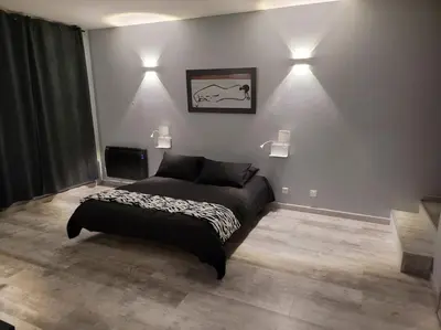 Un ou plusieurs lits dans un hébergement de l'établissement Grand appartement près de la Cathédrale de Quimper