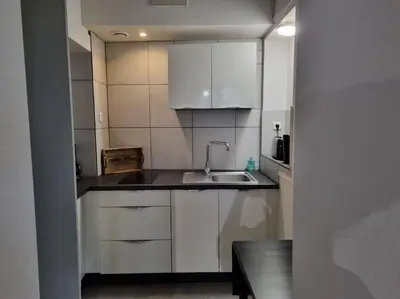 Cuisine ou kitchenette dans l'établissement Grand appartement près de la Cathédrale de Quimper