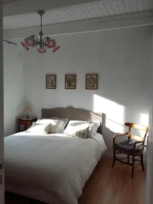 Un ou plusieurs lits dans un hébergement de l'établissement Les chambres de Marie