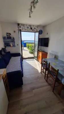 Un ou plusieurs lits dans un hébergement de l'établissement PENMARC’H KERITY location face à la mer