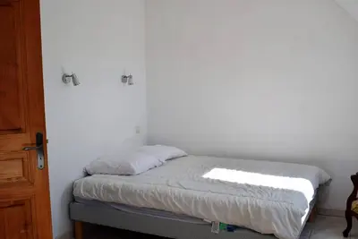 Un ou plusieurs lits dans un hébergement de l'établissement Grande Maison VUE SUR MER 9 pers à Trébeurden - Réf 682