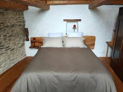 Un ou plusieurs lits dans un hébergement de l'établissement Chambres d'hôtes, Zimmer, Domaine de Kervennec