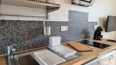 Cuisine ou kitchenette dans l'établissement Vacances Ô Loch - Studio à 200 mètres de la plage - Le Cap Coz Fouesnant