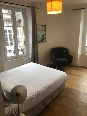 Un ou plusieurs lits dans un hébergement de l'établissement Spacieux T3 en hyper centre