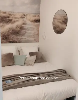 Un ou plusieurs lits dans un hébergement de l'établissement LE 21 Vue sur Mer