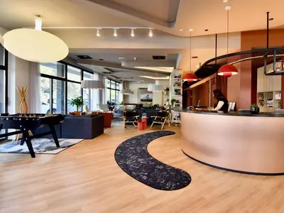 Coin salon dans l'établissement ibis budget Brest Centre Port