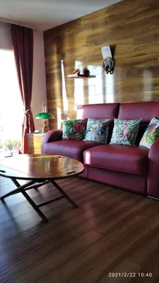 Coin salon dans l'établissement Appartement cosy les pieds dans l’eau, vue mer exceptionnelle