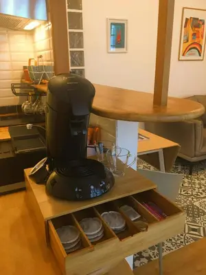 Coin salon dans l'établissement Au COCON QUIMPEROIS